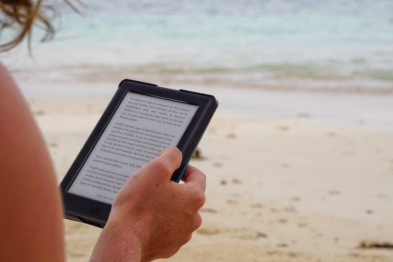 Woman reading on the beach