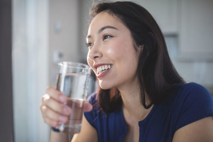 woman drinking water