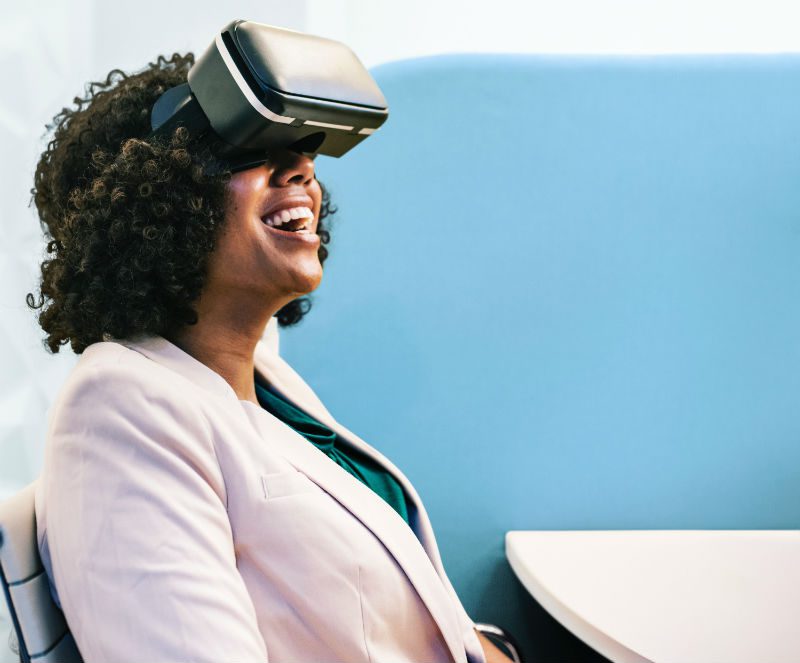 Woman using VR glasses