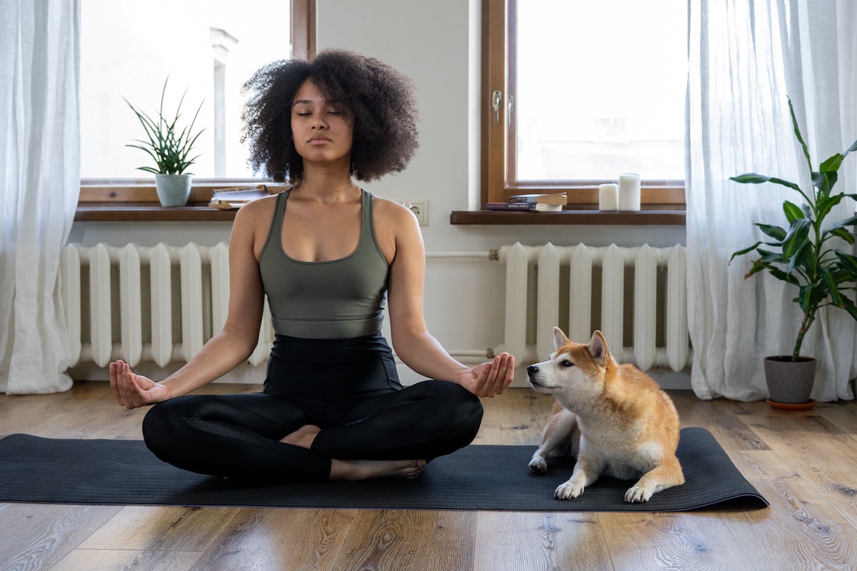 Woman in a yoga sutras pose