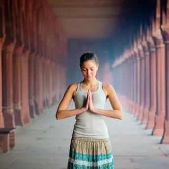 Woman praying in temple