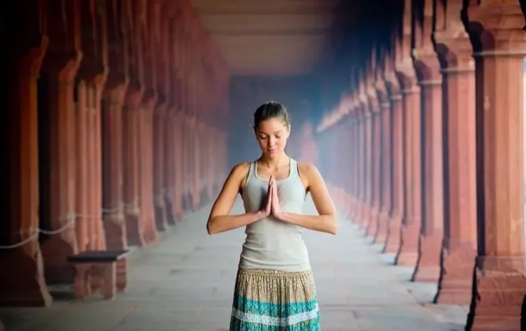 Woman praying in temple