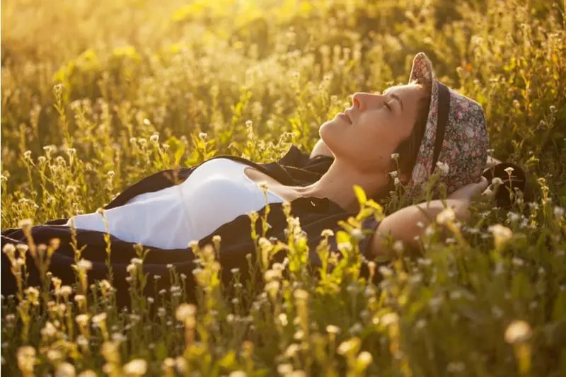 Woman lying in the grass