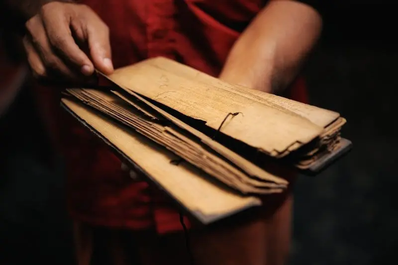 Woman reading ancient texts