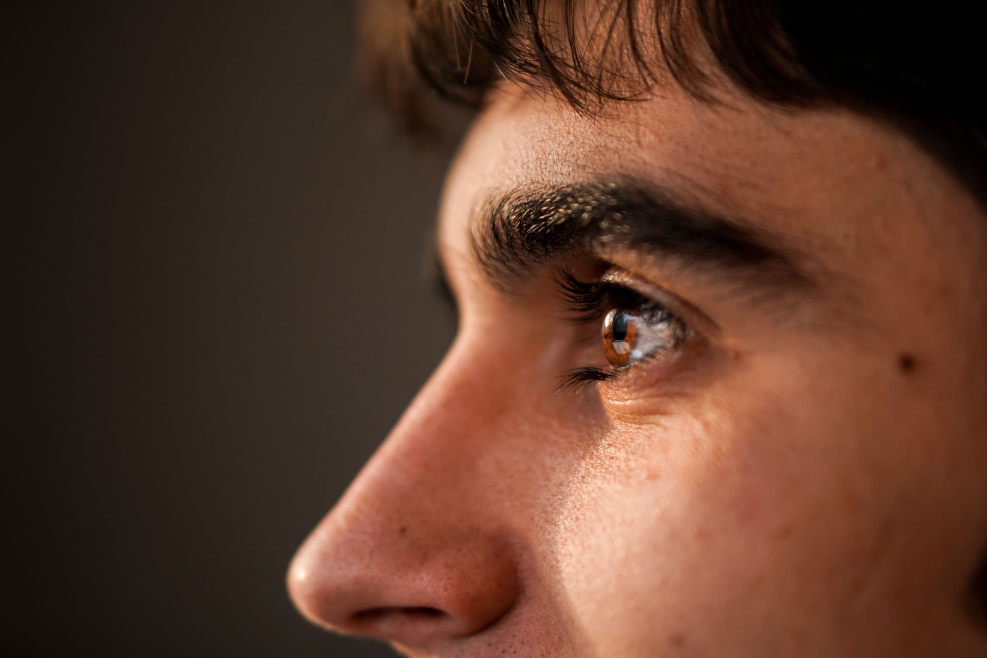 man eyes side profile close up