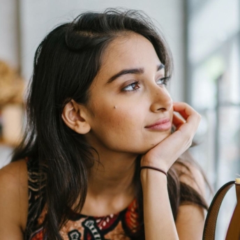 Woman thinking about the brain regions