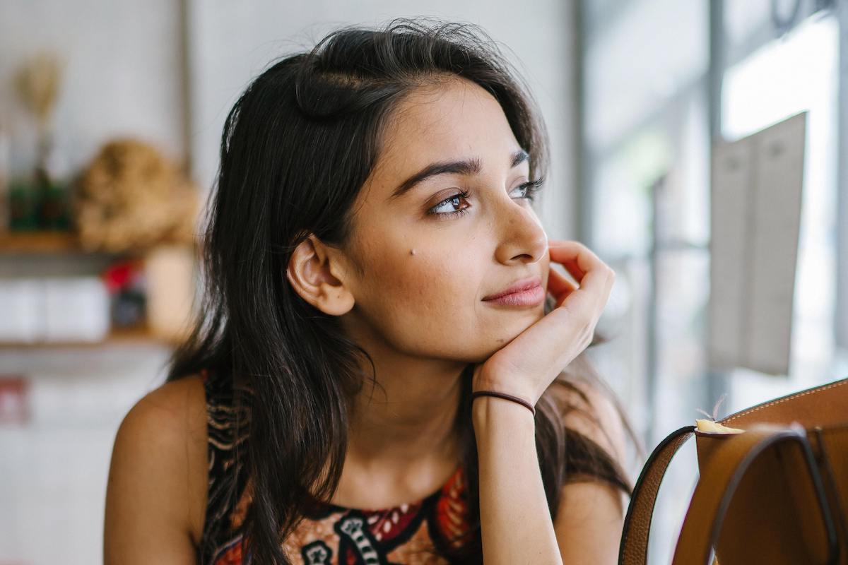 Woman thinking about the brain regions