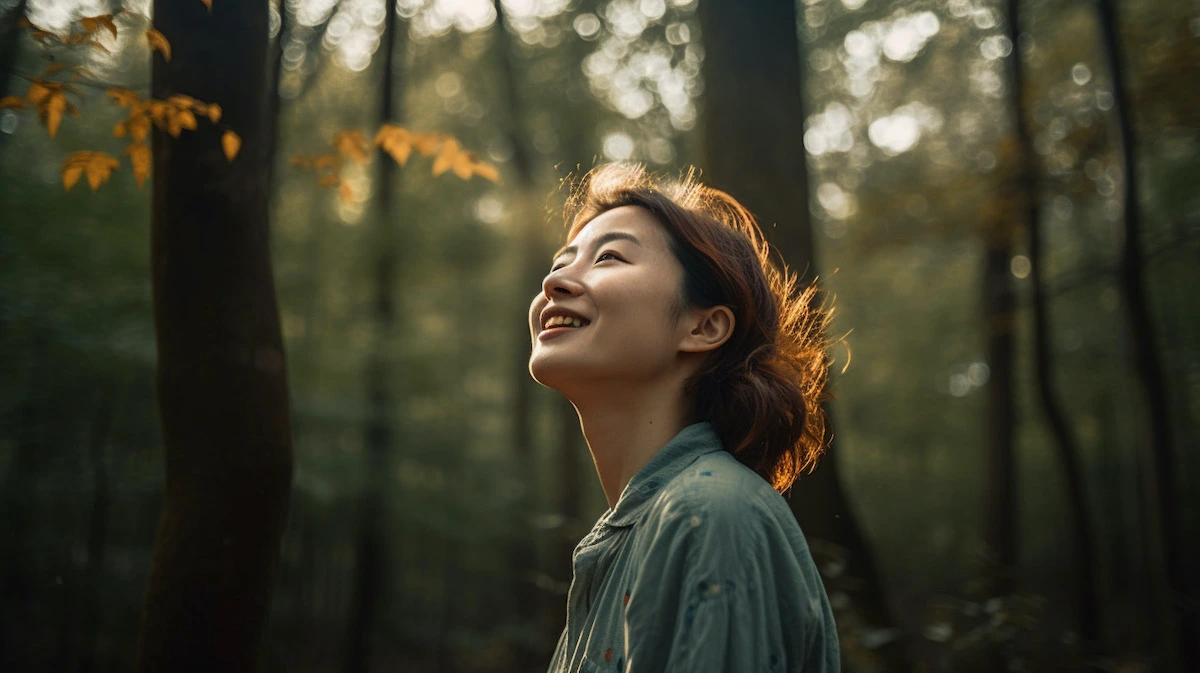 Woman standing in the forest to connect with the spirit world