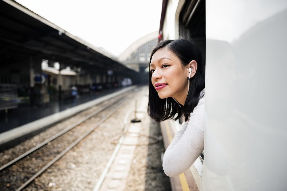 Woman riding a train