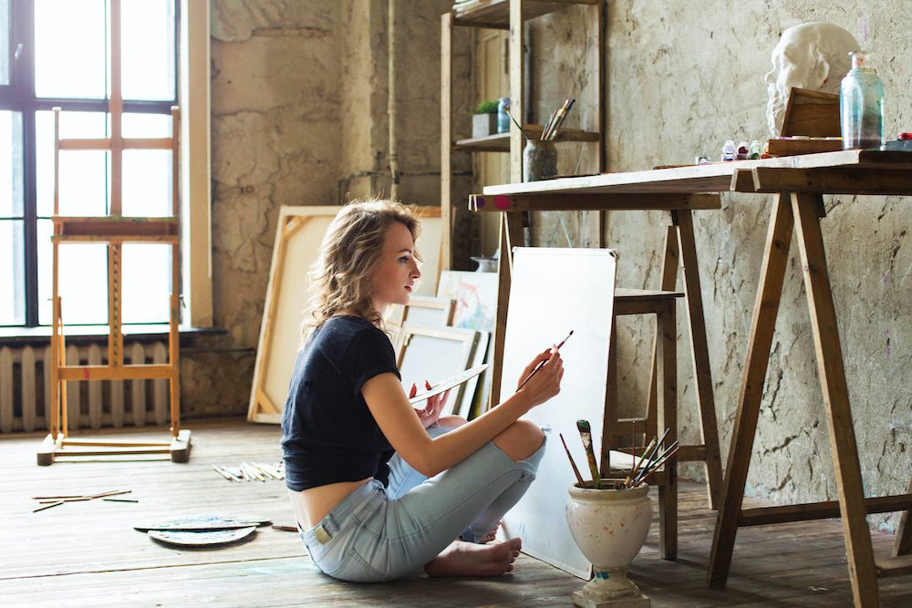 Woman painting for promote positive thoughts