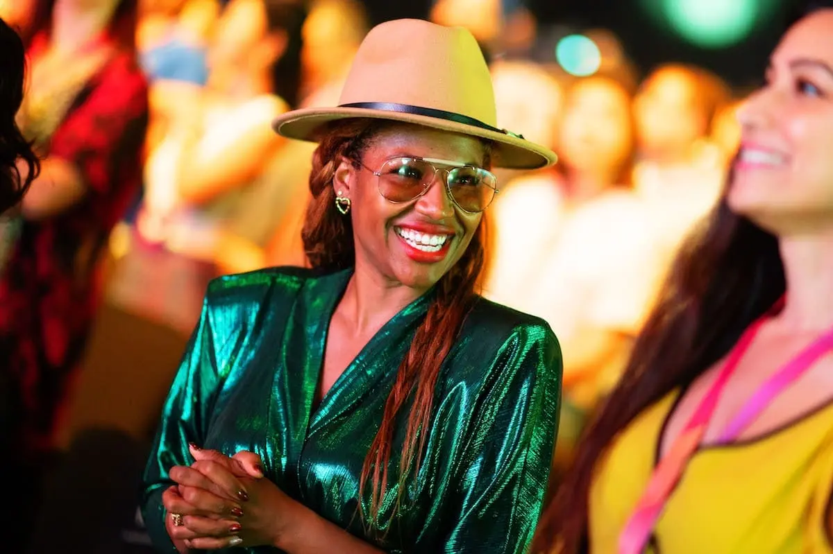 Woman smiling at a Mindvalley event