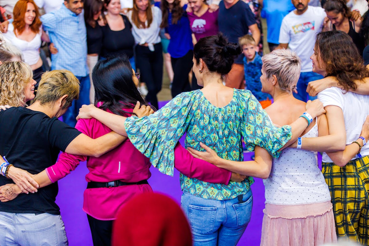 MVU students hugging each other in a circle