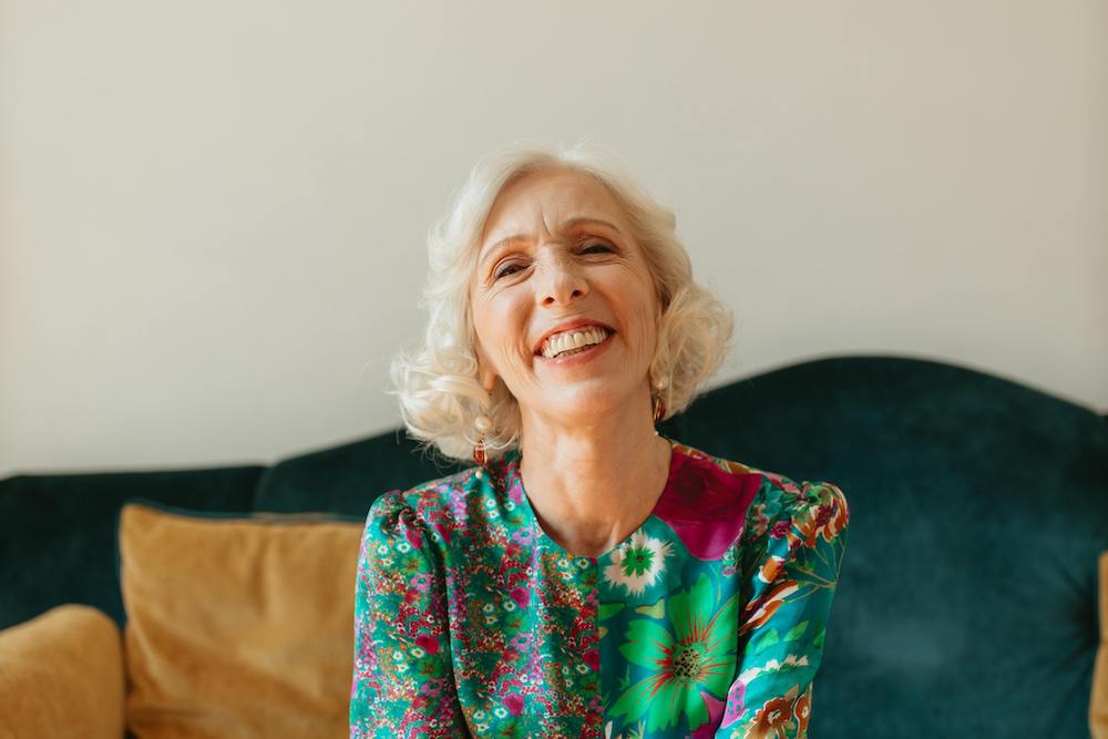 Senior woman smiling at old age