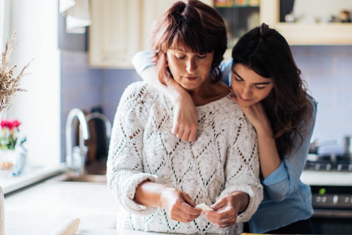 Teen hugging mom