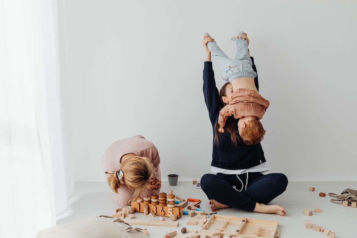 Parents using permissive parenting while playing with child