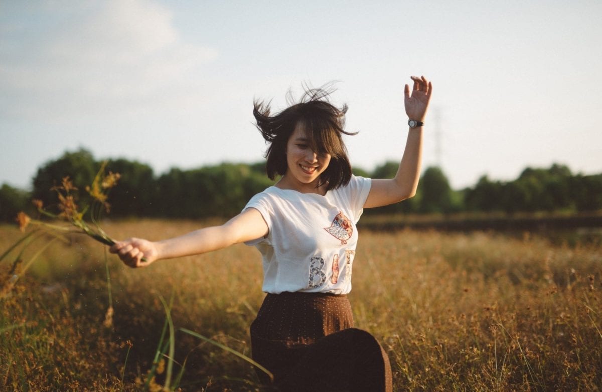 woman dancing on the field