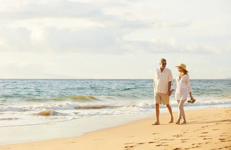 Couple walking on the beach