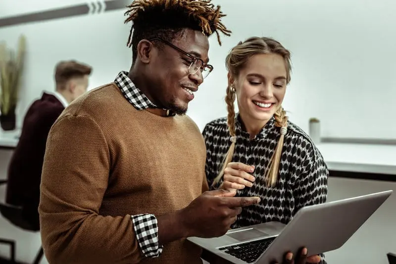 People looking at computer