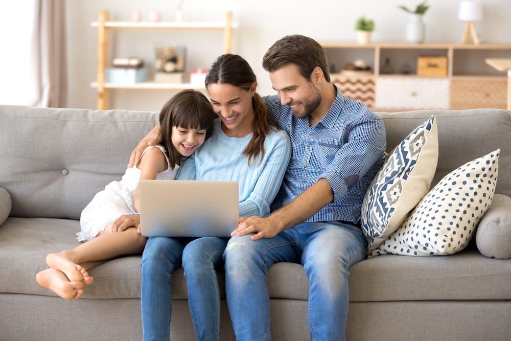 A family with a laptop