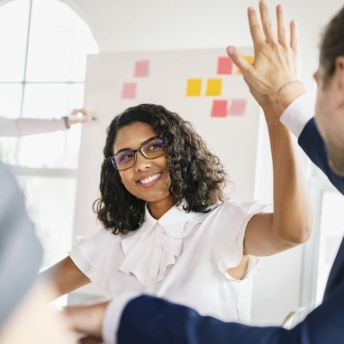 woman gives hi-five