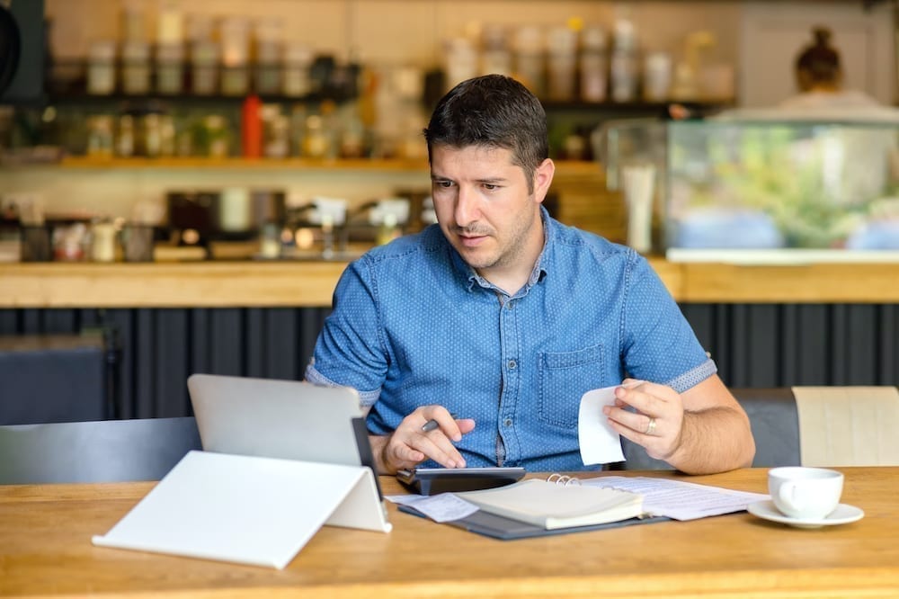 Man calculating his finances