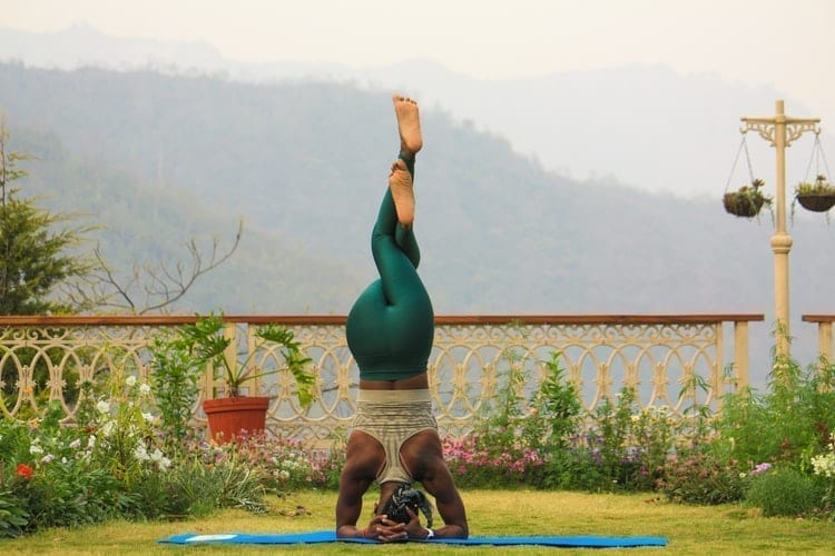 Woman practicing yoga in the morning