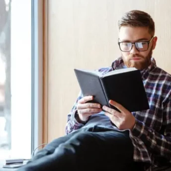 Man reading to improve his mental health