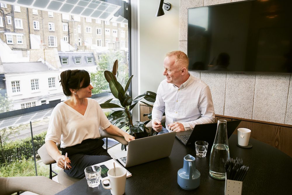 Woman handling difficult conversations at work