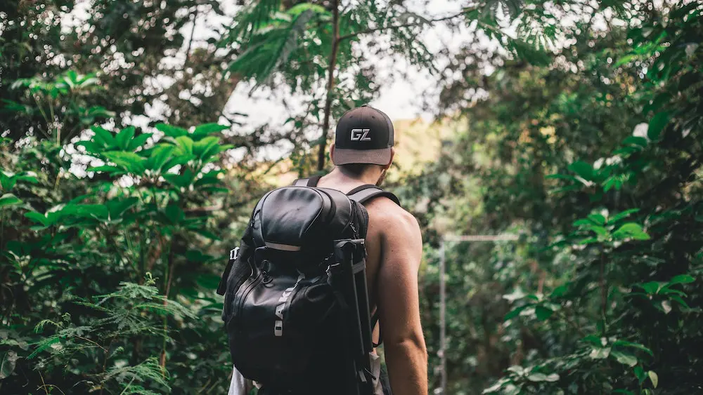 Man hiking in the forest as an extraordinary human being