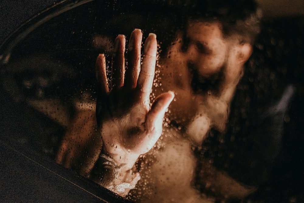 Couple kissing in a car