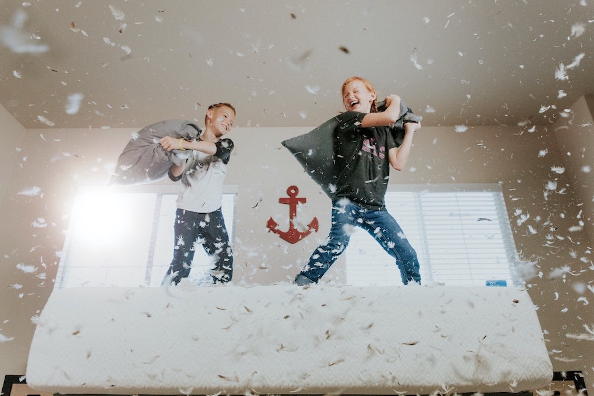 Children having a pillow fight 