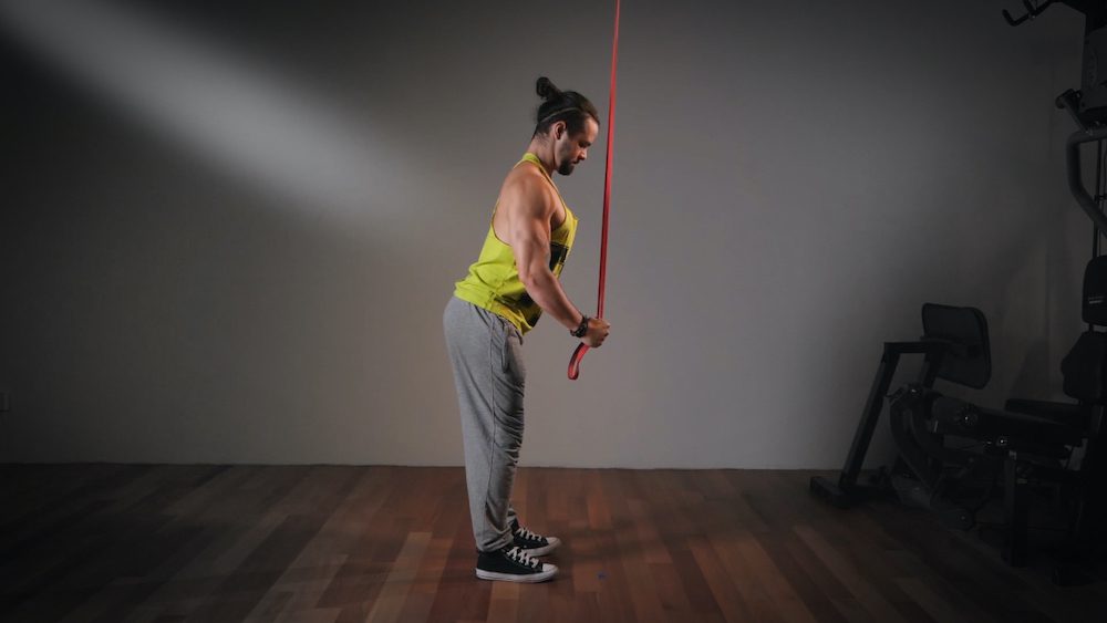 Ronan doing resistance band pushdown