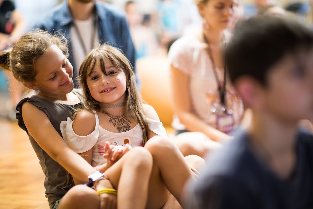 Girls at Mindvalley University 2019 in Pula, Croatia showing how to raise confident kids