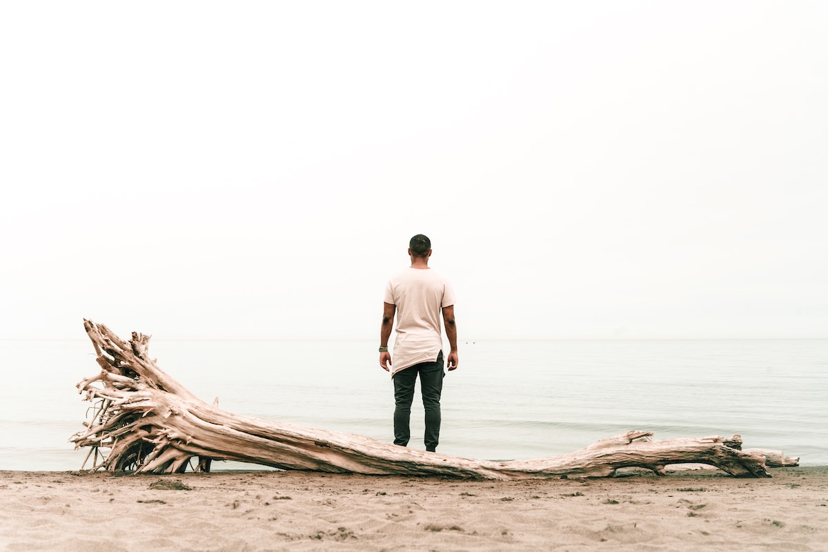 Man staring at the ocean