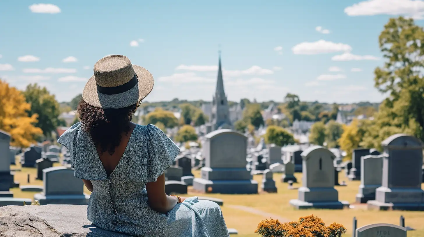 A woman sitting at a cemetary
