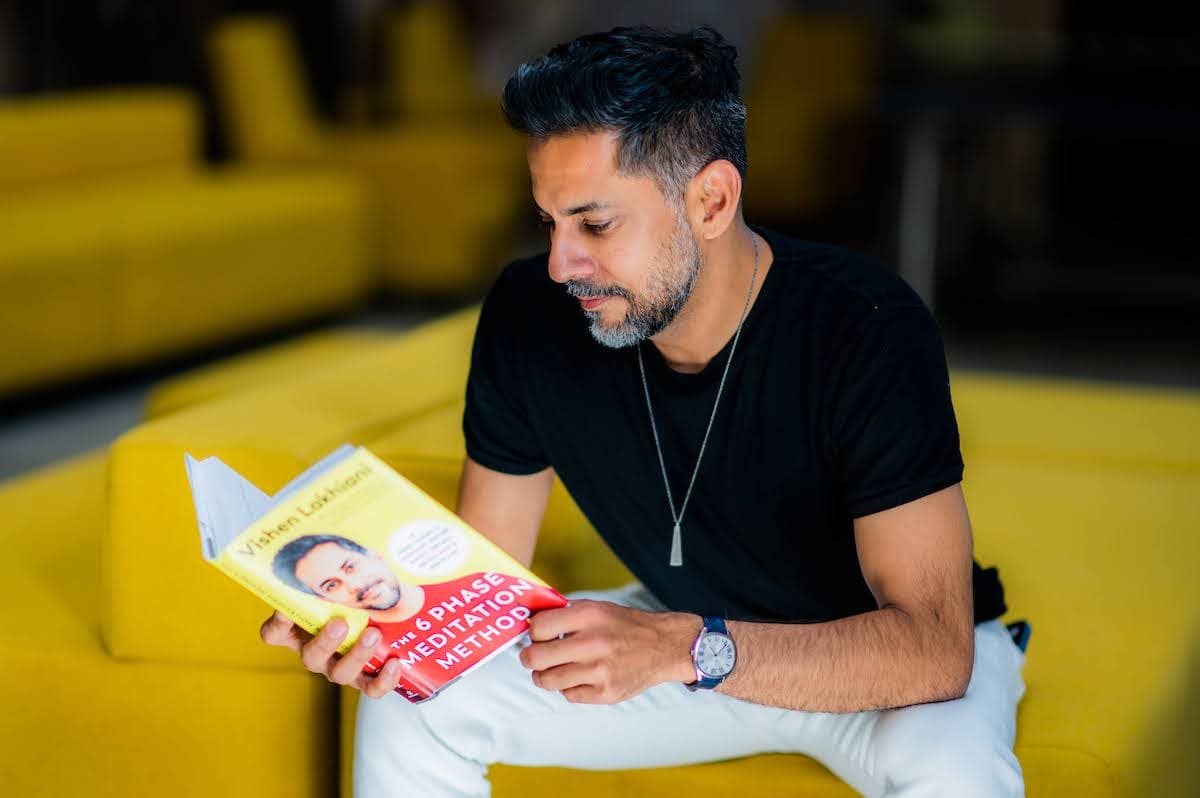 Vishen reading his book, The 6 Phase Meditation Method