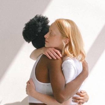 Women hugging to show what is forgiveness