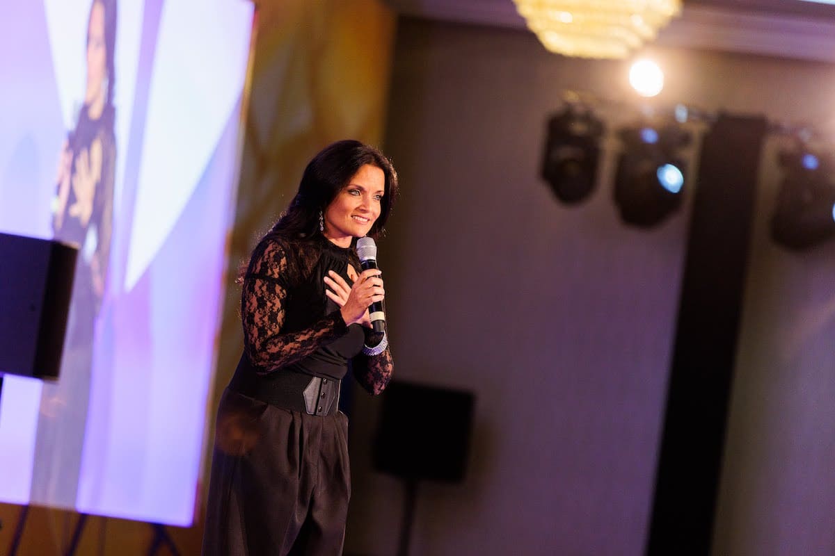 Dr. Shefali Tsabary on stage at Mindvalley's A-Fest 2022 in Jordan speaking about how to be true to yourself