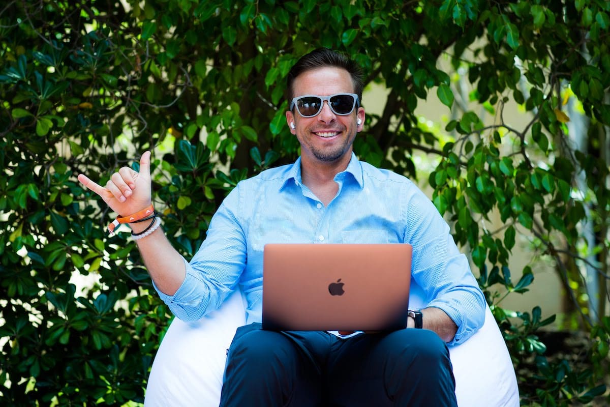 Man on laptop learning how to create an online course