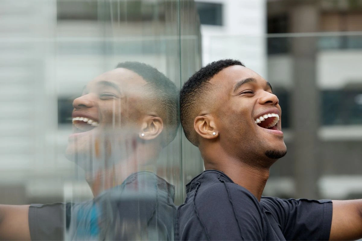 Happy man laughing