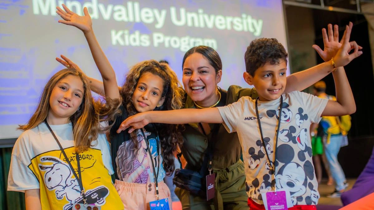 Gigi Márquez Suárez, the events lead for Mindvalley Youth Programs, with young participants of Mindvalley University 2022 in Tallinn, Estonia