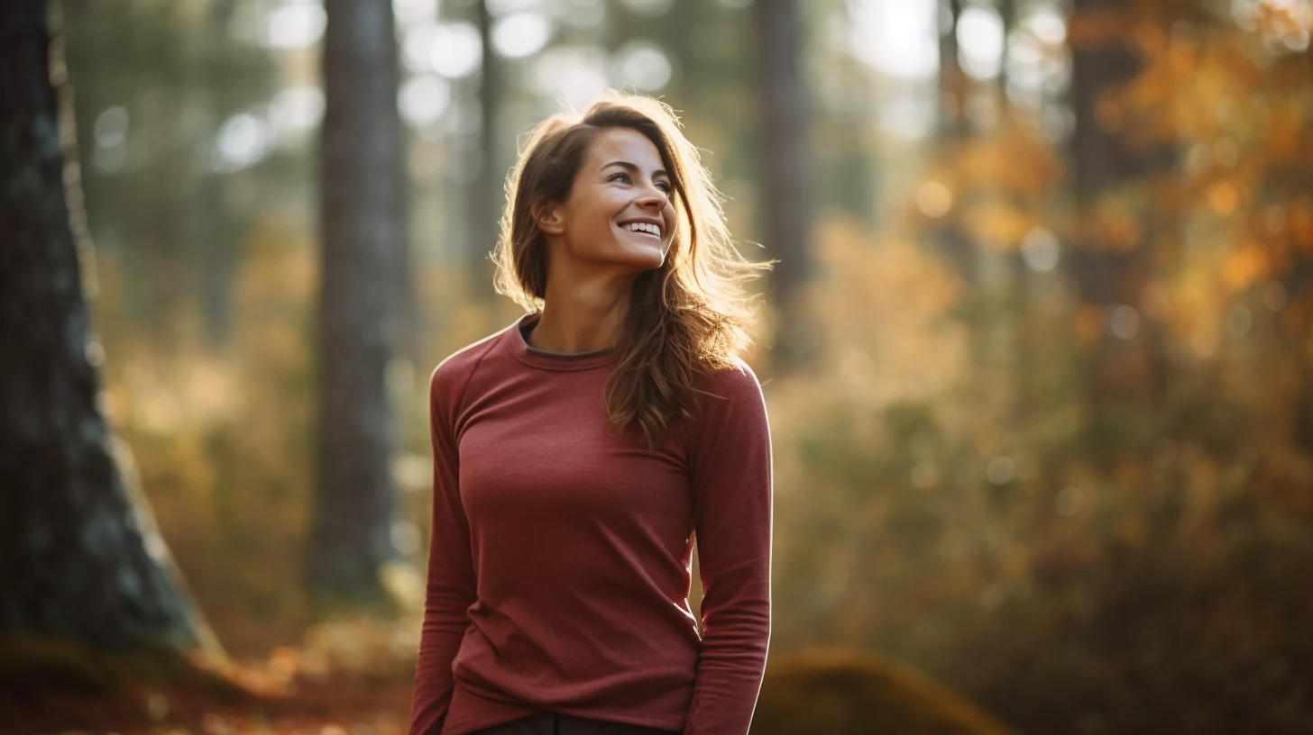 A woman walking in the forest to transcend her spiritual ego