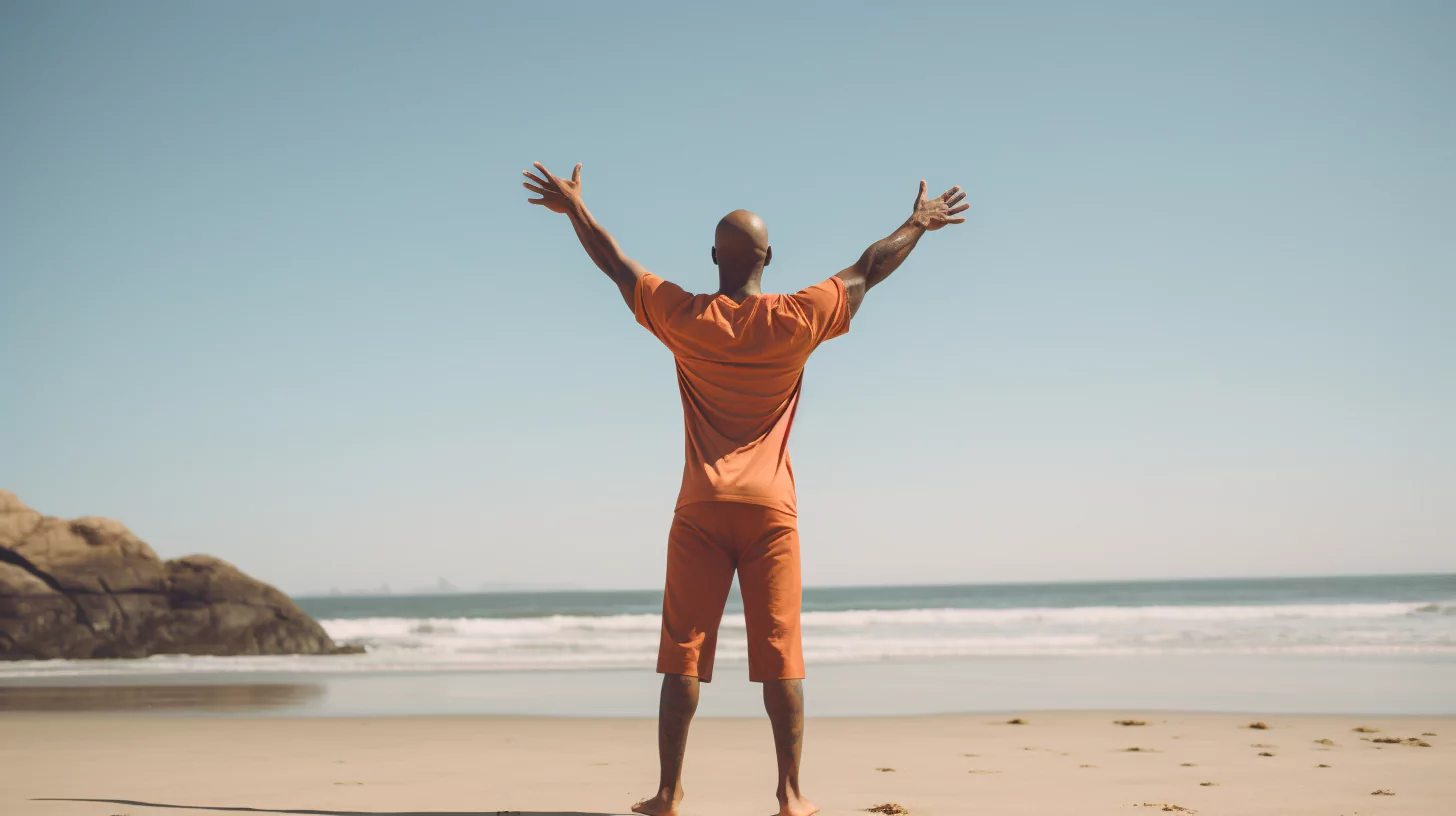 A man standing on a beach and having a kundalini awakening