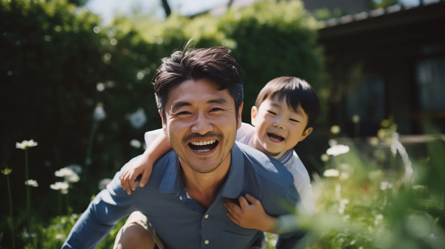 A man with his stepson playing in the garden