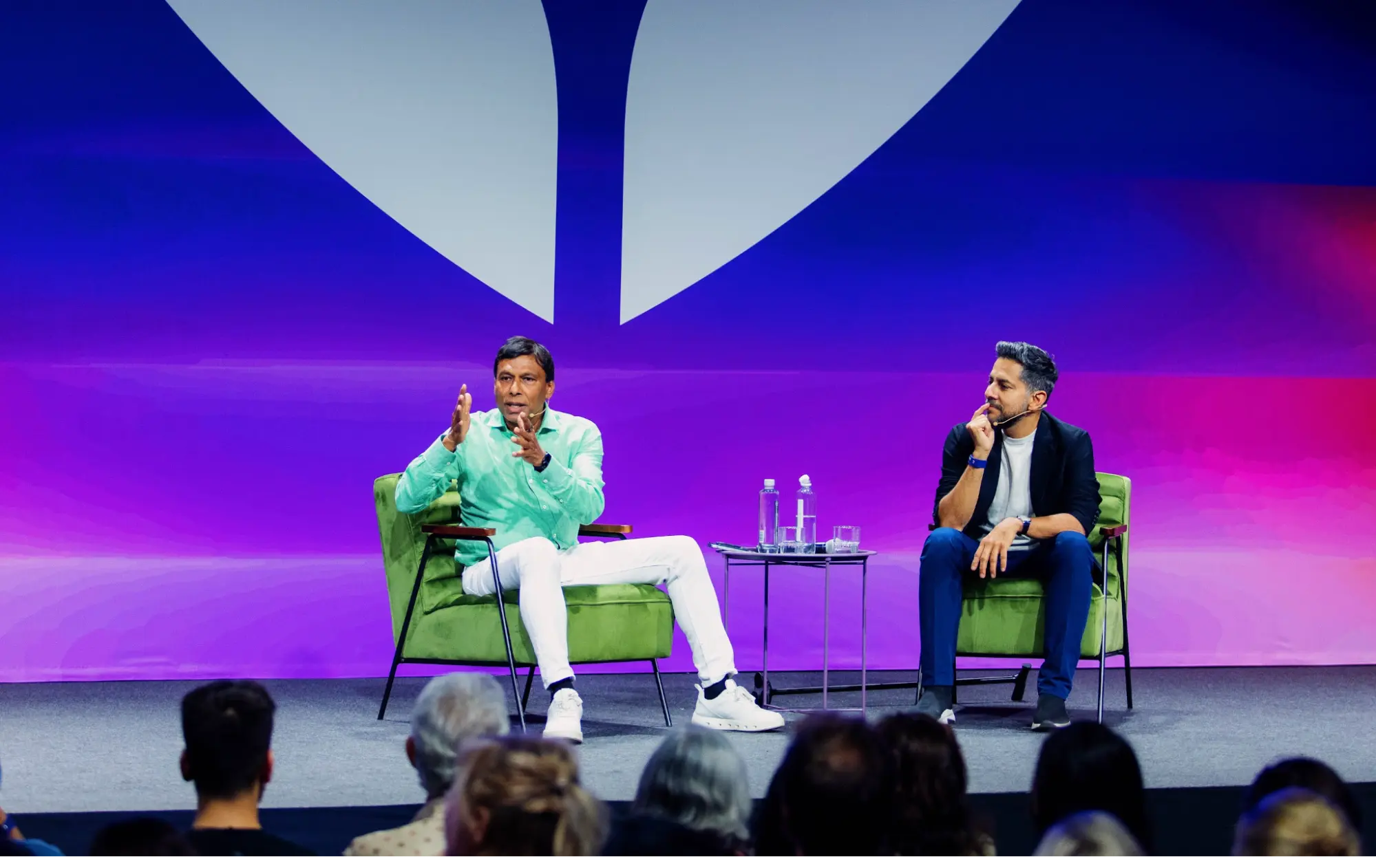 Naveen Jain on stage with Vishen