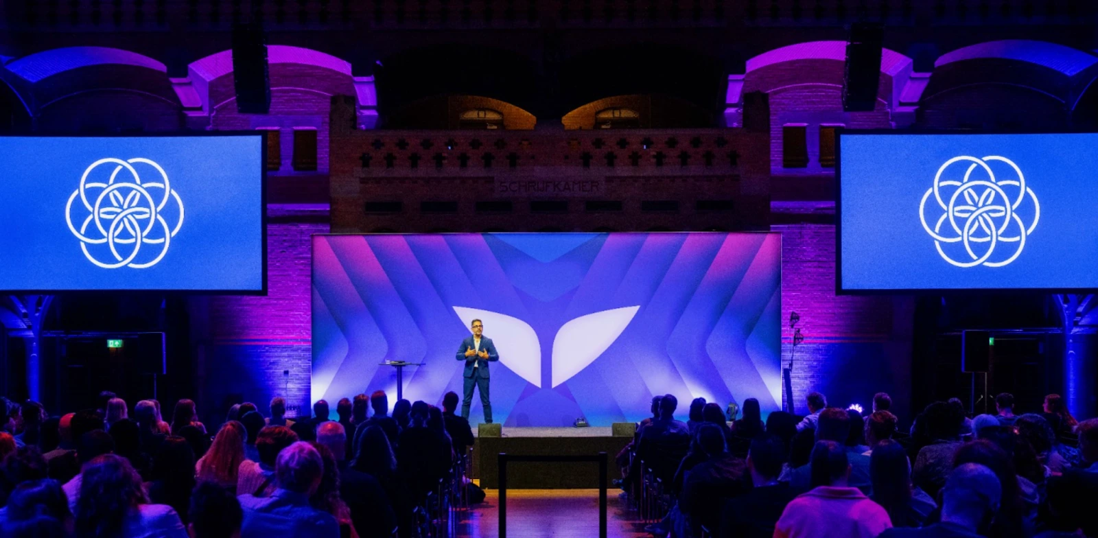 Vishen on stage at Mindvalley University in August 2025.