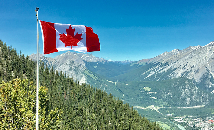 Canadian flag mountain background