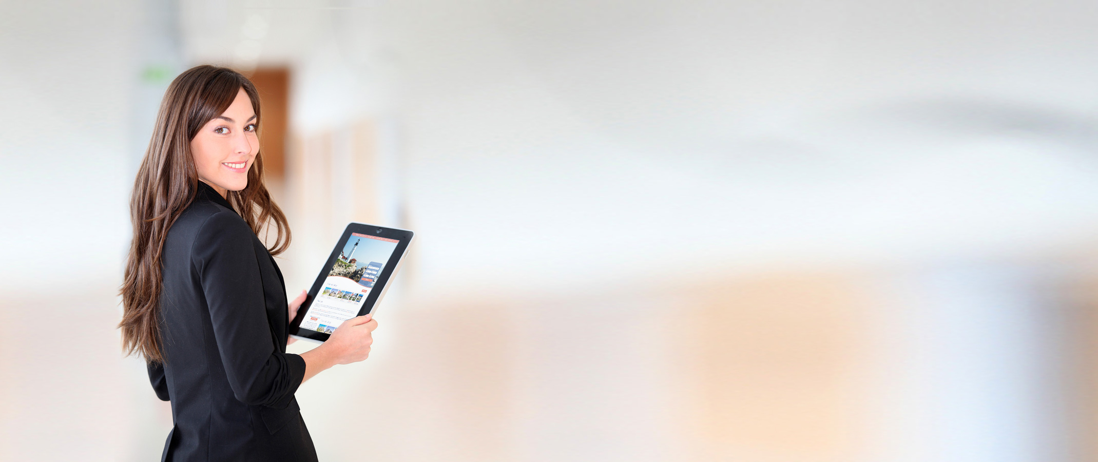 woman holding tablet