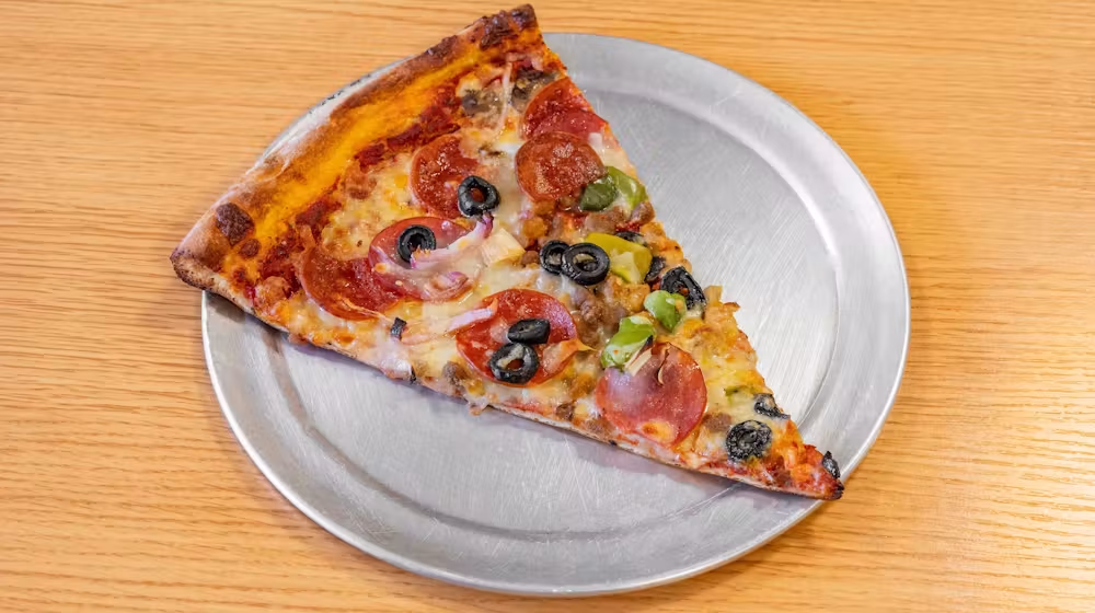 Supreme pizza slice