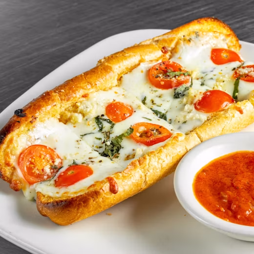 Bruschetta on toasted bread with tomato and basil